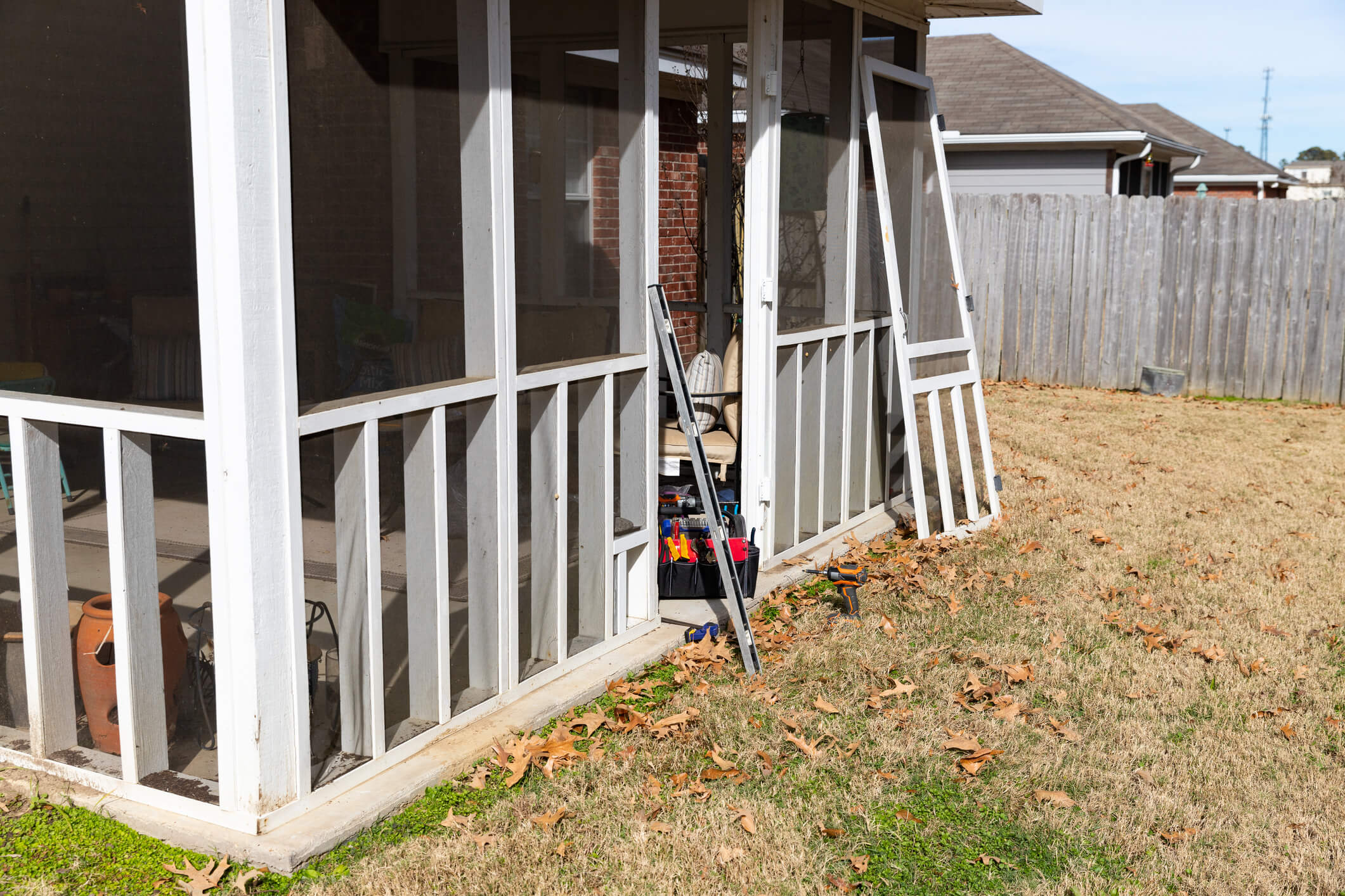 window screen repair on a porch